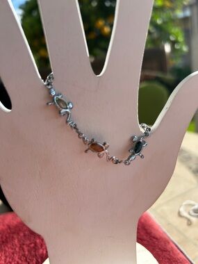 Small Silvertone Multi-Color Turtle Link Bracelet. Used some damage see pictures